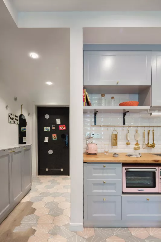 1782711366127546.webp grey-blue kitchen cabinets and entry storage for apartment hotel