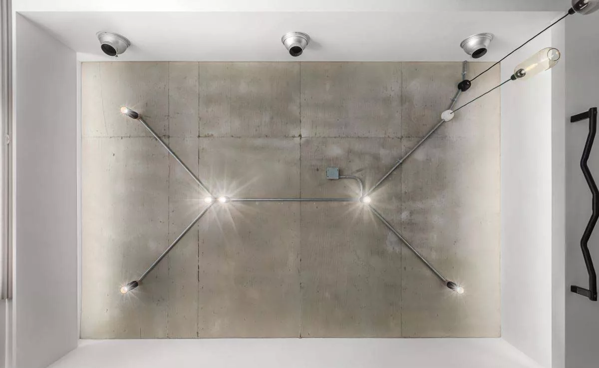 industrial style lighting and ceiling details for apartment hotel