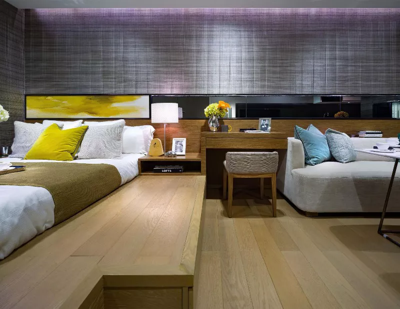 executive studio galley kitchen and long-stay living area