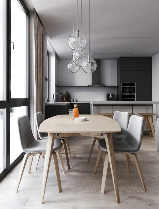 open-plan apartment dining furniture beside kitchen cabinets
